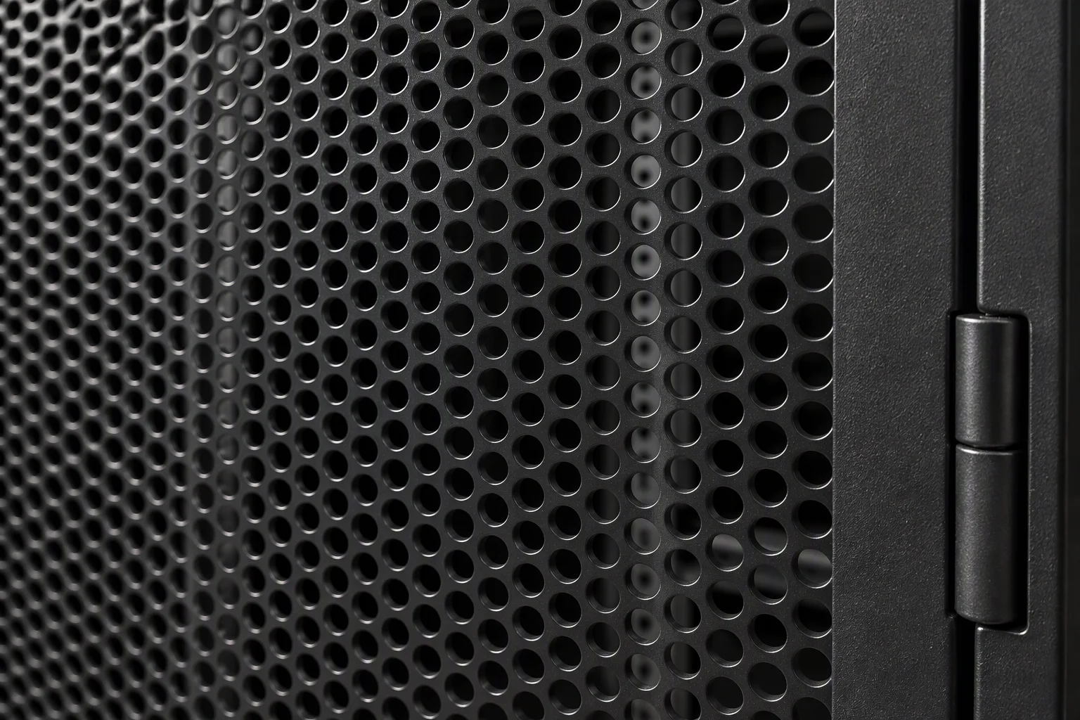 Perforated mesh front door on a rack row