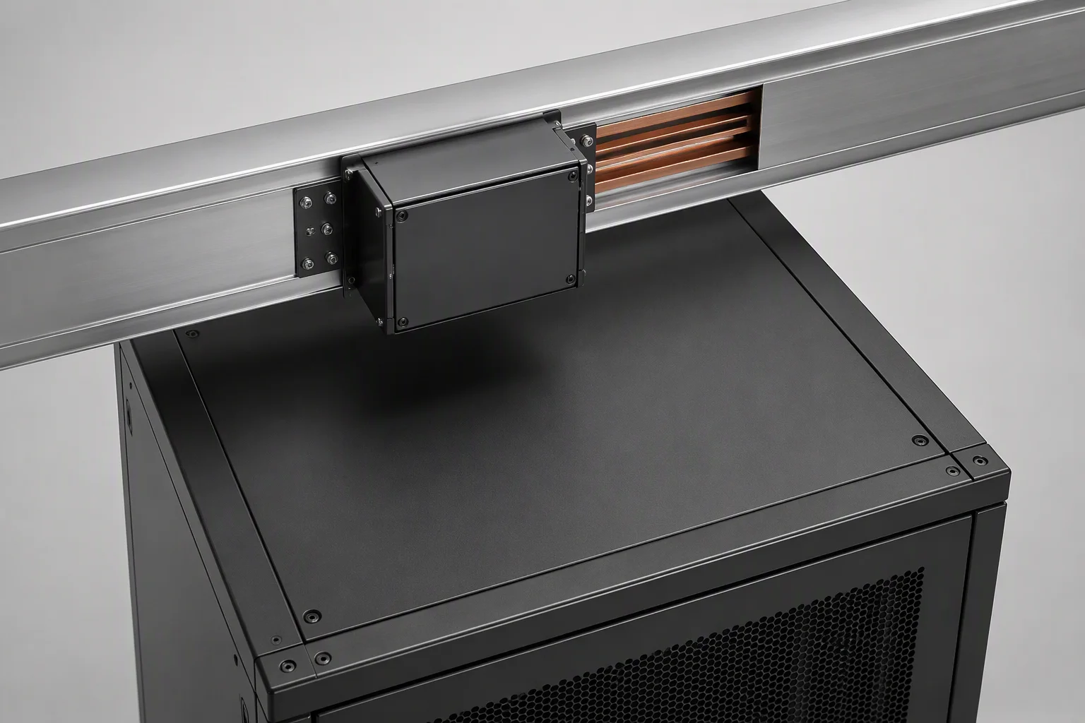 Rack column slotted for overhead busway with a tap-off box bracket and cable trough